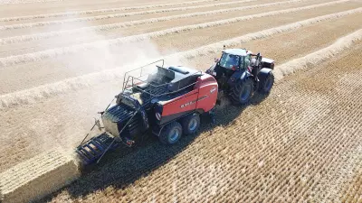 SB 1290 iD baling in a straw field