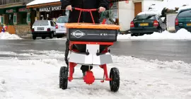 K51 pushed salt, sand, gravel spreader in the snow