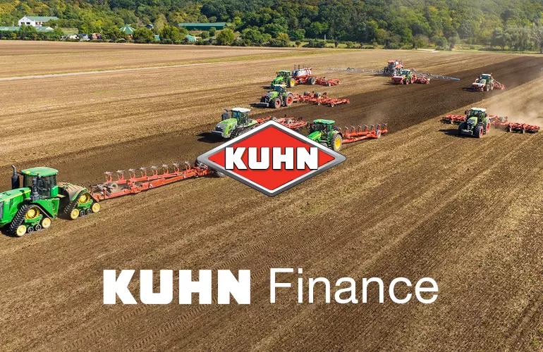 crop machinery in a brown cultivated field