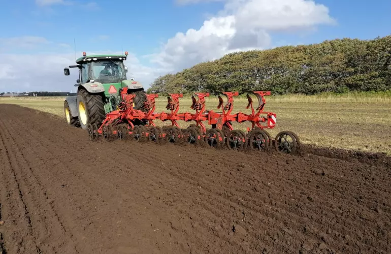 Mounted Plough MASTER L working in a field