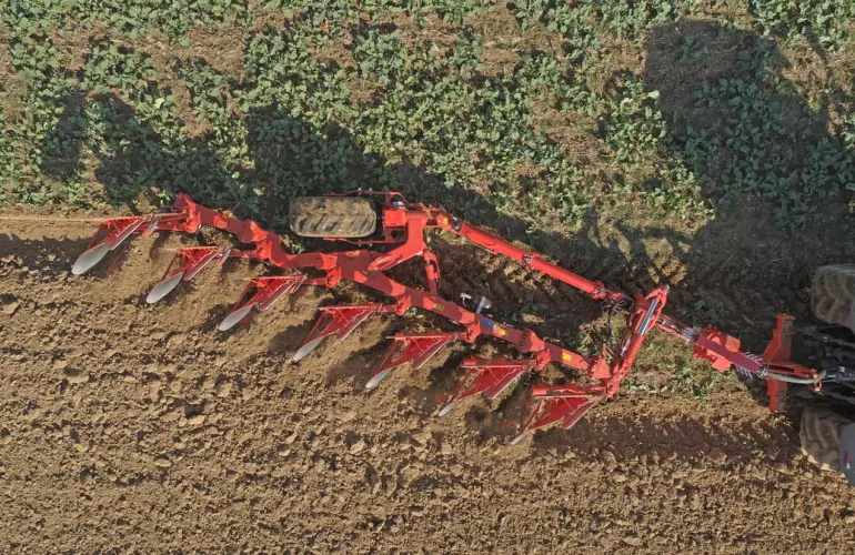 Sami Mounted plough VARI LEADER aerial shot of working in a field