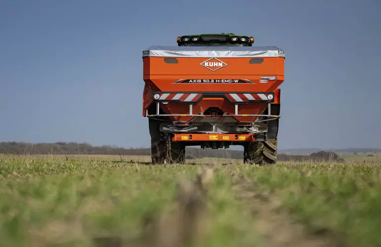 AXIS 40.2 H-EMC-W fertiliser spreader at work