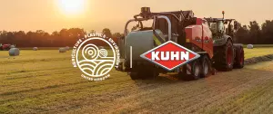 KUHN baler wrapping bales in the last of the summer sunshine