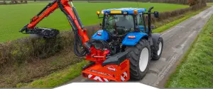 KUHN hedgecutter cutting hedges on narrow lane