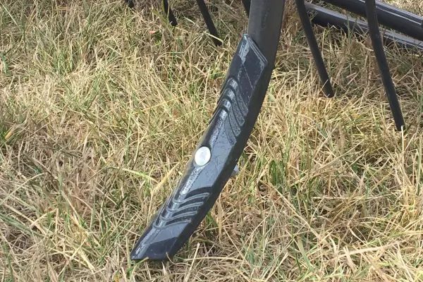 The reversible straight share mounts on the S tine of the PROLANDER