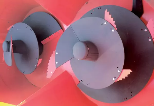 The mixing auger speed adjustment from the cab