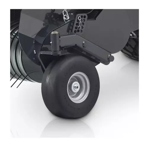 Pivoting semi-pneumatic pick-up guide wheels allow the pick-up to adapt to changing field conditions.