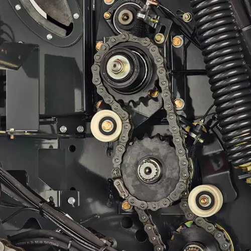 The second driven roller secures bale rotation