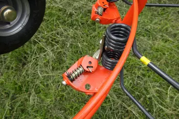 Individually mounted, pivoting tines feature nylon bearings.