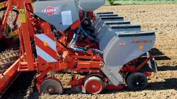 Side view of a PLANTER 3 at work with opening discs