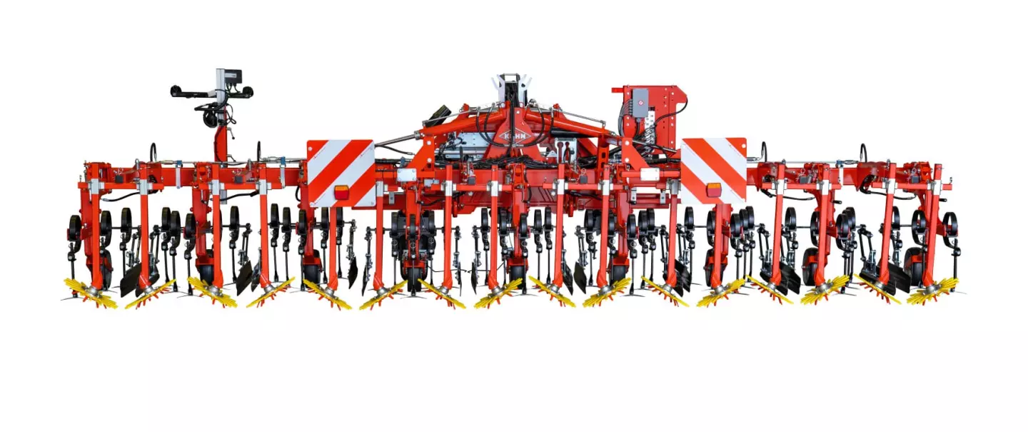 Kuhn's row crop cultivator Rowliner with multiple rows of black tilling implements and yellow soil-working attachments spans horizontally across a white background.
