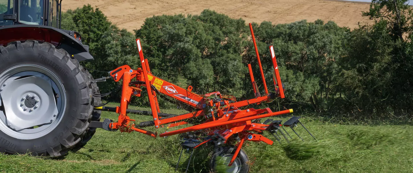 The GF 8703 tedder at work on a plot