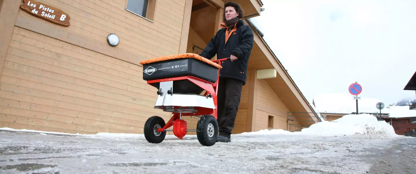 K51 pushed salt, sand, gravel spreader in the snow