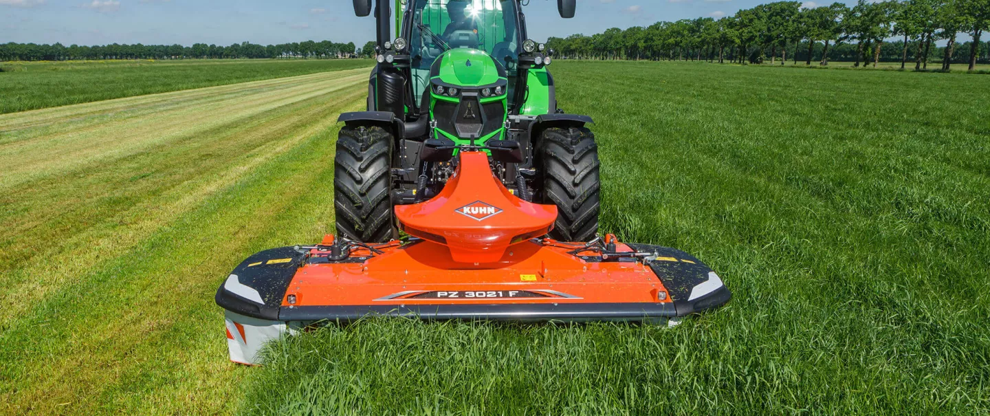 The KUHN PZ 3021 F front drum mower