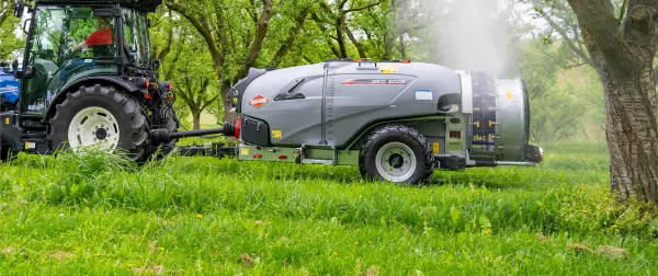 A KUHN GEO Sprayer in an apple orchard