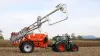 KUHN AERO GT pneumatic fertiliser spreader at work