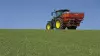 AXIS 40.2 H-EMC-W fertiliser spreader at work