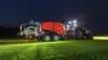 FBP 3135 3D wrapping a bale in the dark lightened with working lights