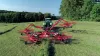 Individual rotor lift for work in triangular fields