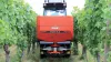 MDS 8.2 fertiliser spreader at work in a vineyard with controlled spreading on two rows