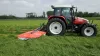 PZ 170 drum mower mowing gras in a flat field