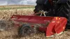 RM 320 shredder at work in a corn field